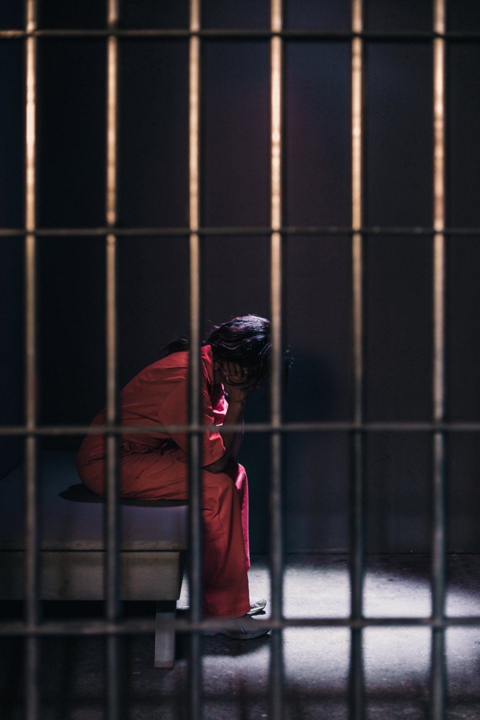A figure alone inside a cell