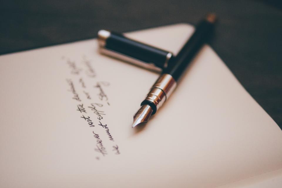 Fountain pen on a filed document